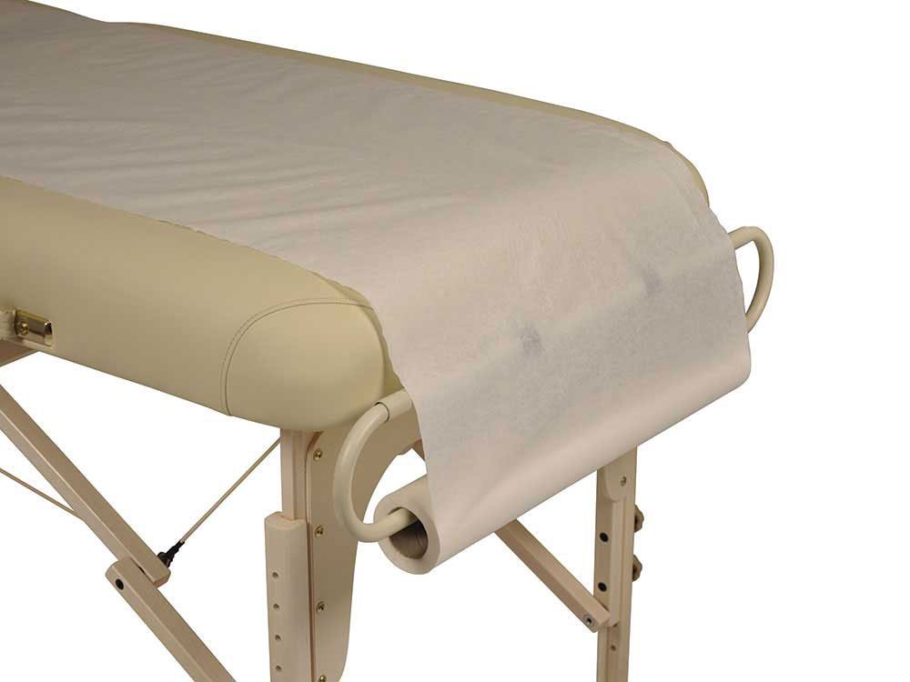 Papirrulle holder til massagebriks